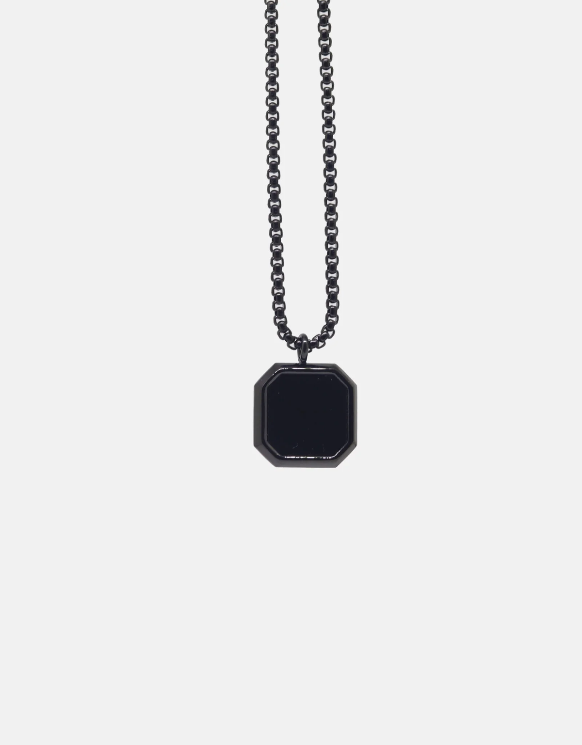 Black octagonal pendant necklace on chain