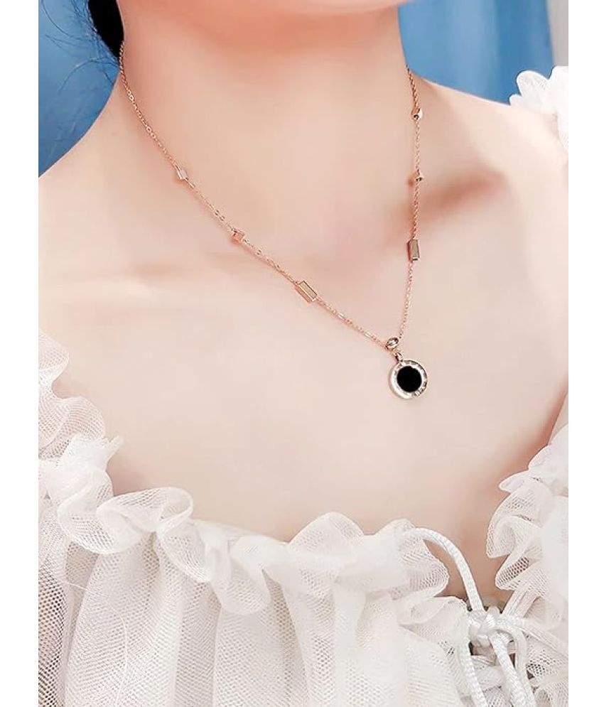 Black onyx circle pendant necklace on satin background