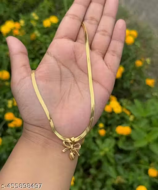 Gold-tone bow and heart pendant necklace product view