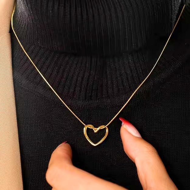Gold-tone heart pendant necklace with adjustable extension chain