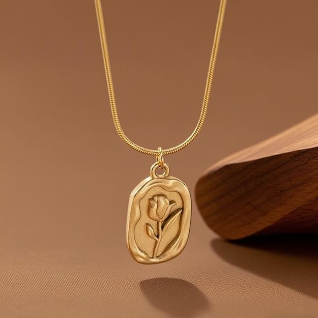Gold-tone floral pendant necklace product photo
