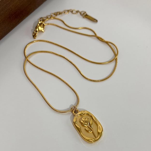 Gold-tone floral pendant necklace close-up