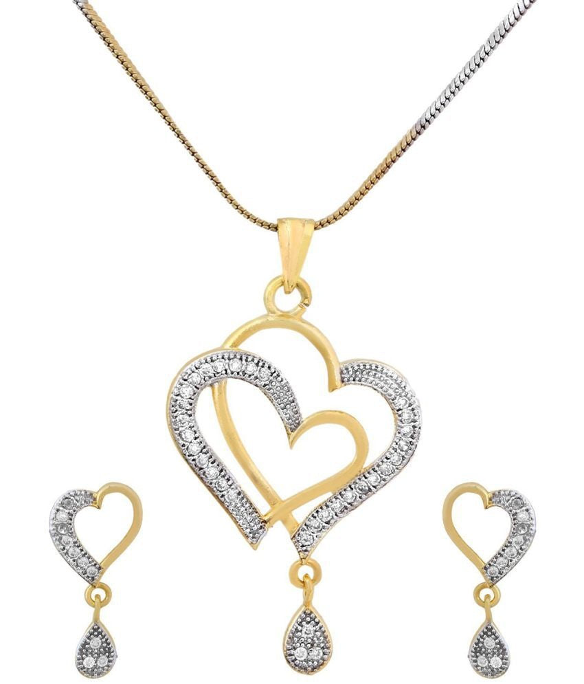 Gold-tone and silver-tone heart pendant jewellery set on display