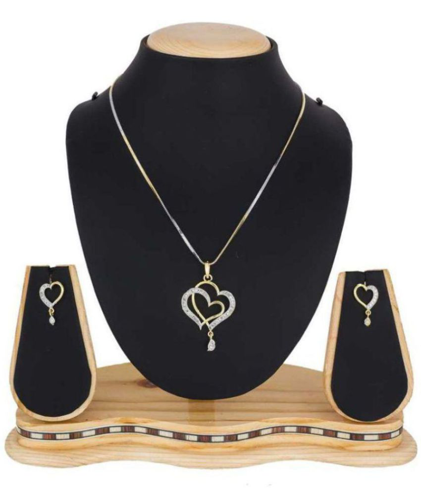 Heart pendant necklace and matching earrings close-up