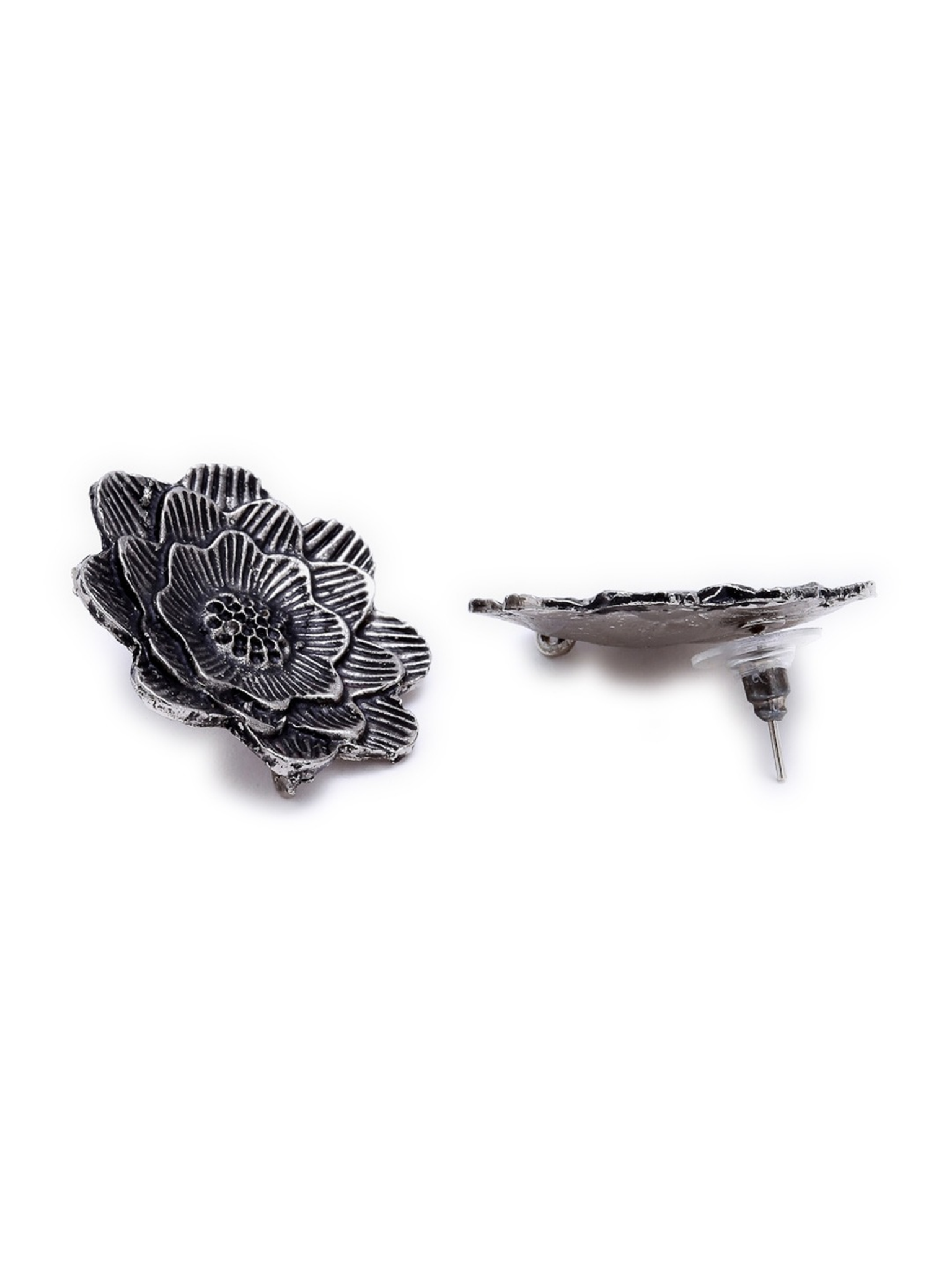 Close-up of oxidised silver-tone floral jewellery set