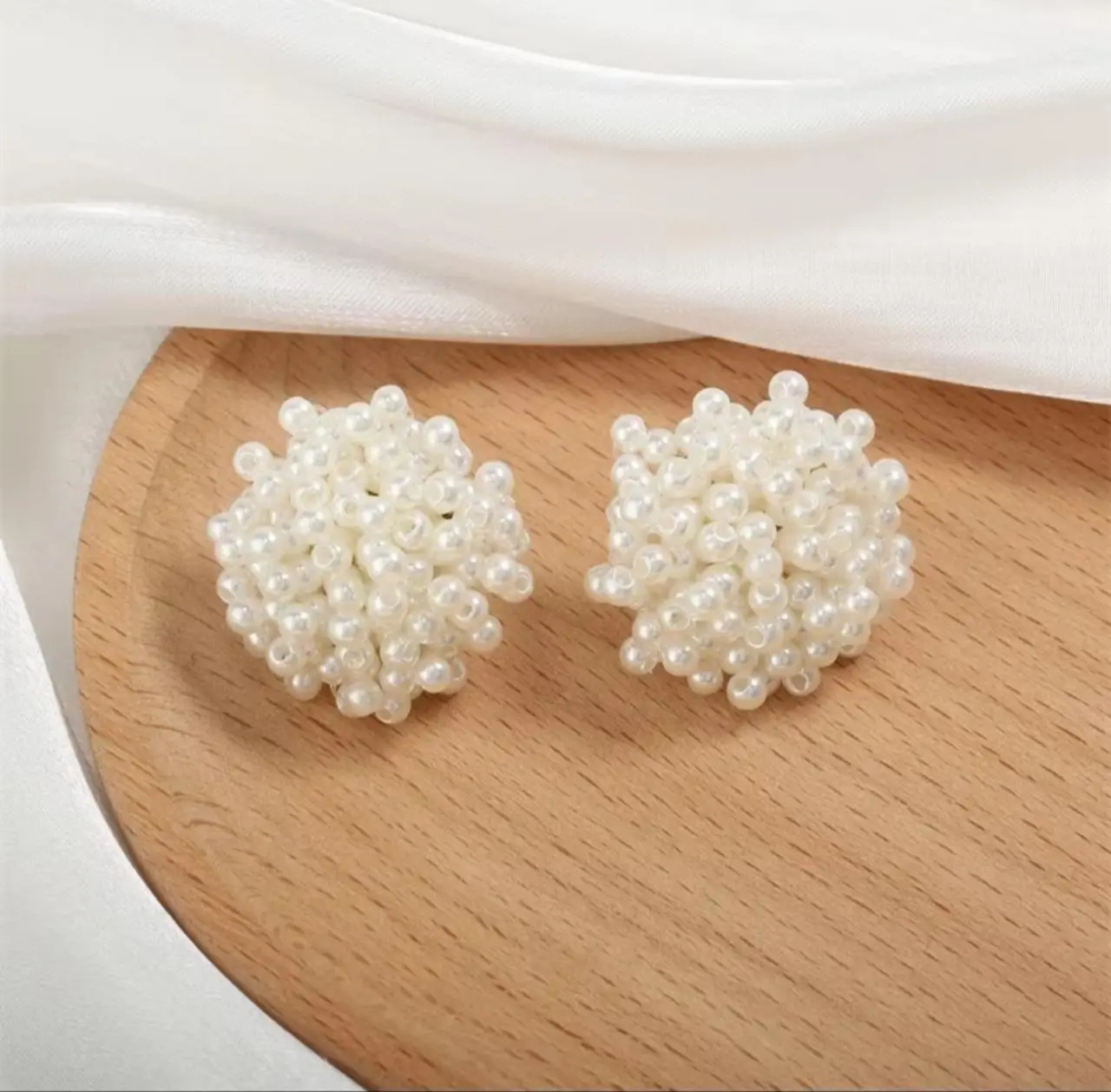 White pearl beaded stud earrings care and features