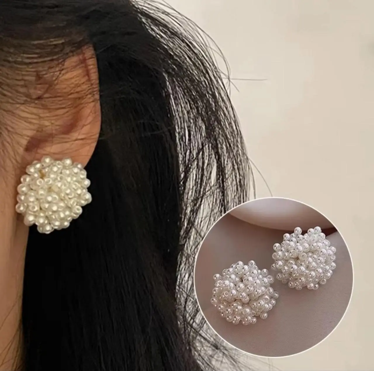 White pearl beaded stud earrings close-up