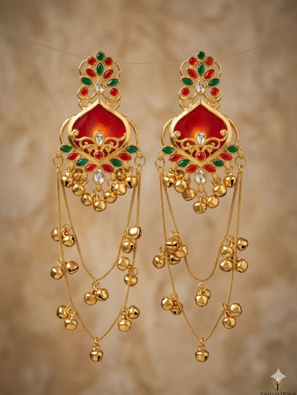 Red and green traditional long jhumka earrings lifestyle view