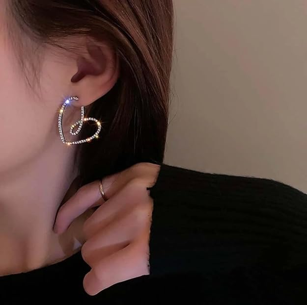 Crystal-pave heart earrings in jewellery box