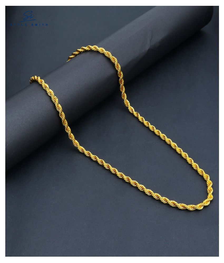 Gold-tone twisted rope chain on black background