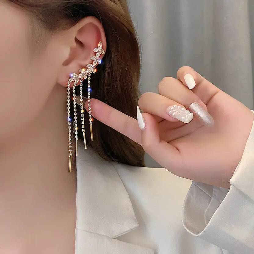 Crystal floral chain tassel earrings on display