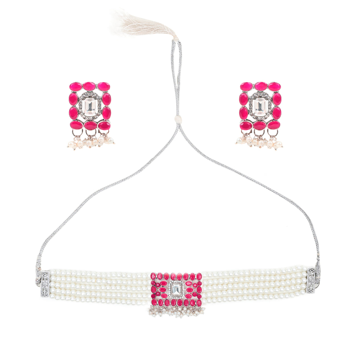 Close-up of pearl choker with pink stone centre motif